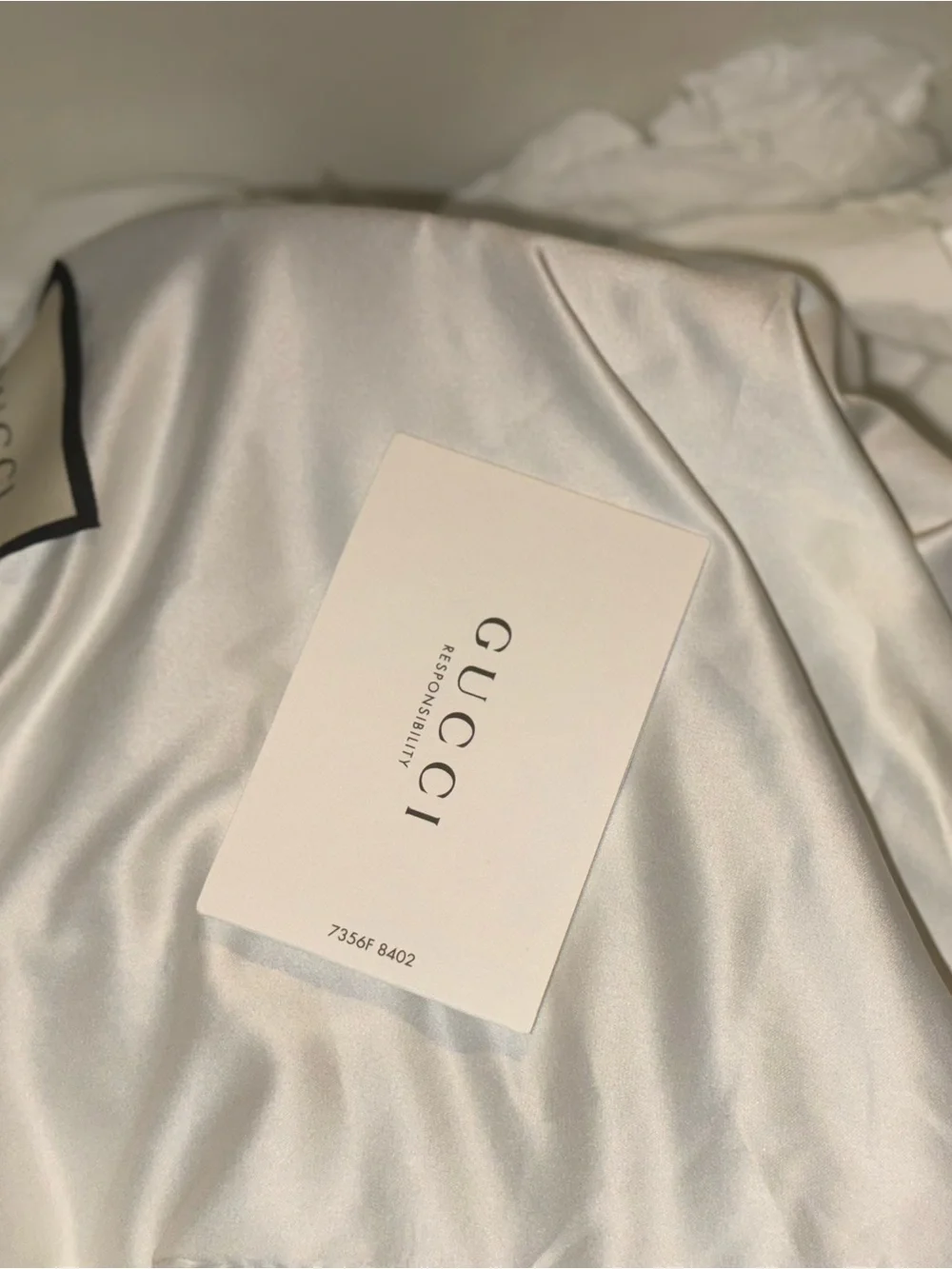 Gucci White Satin Card and Tag on Silk Garment